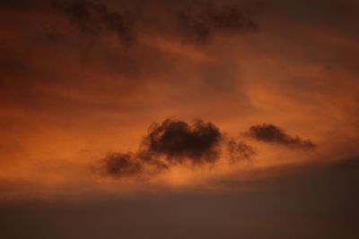 Low angle view of dramatic sky during sunset