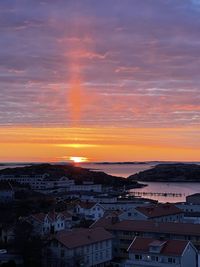 High angle view of townscape against sky during sunset