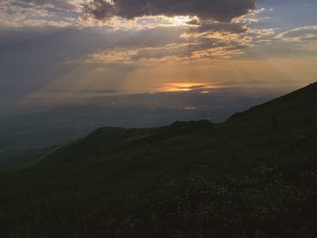 Scenic view of landscape against sky during sunset