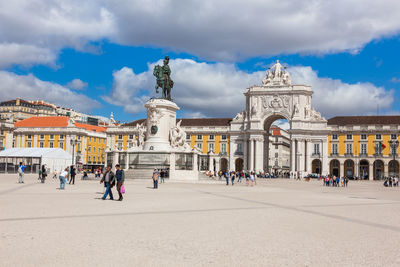 Group of people in front of historical building