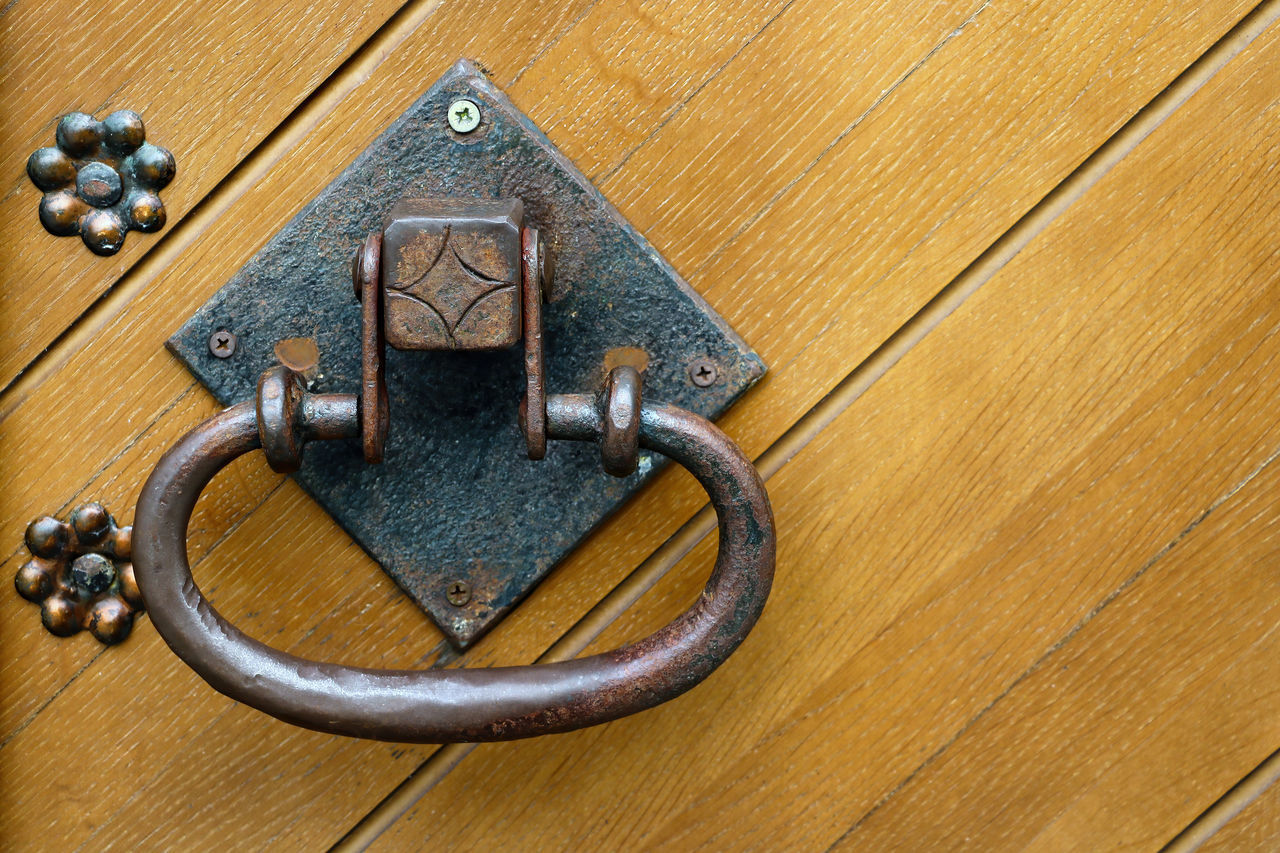 CLOSE-UP OF METAL DOOR