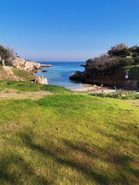 Scenic view of sea against clear sky