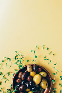 High angle view of fruits in plate on table