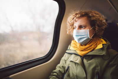 Portrait of woman in train