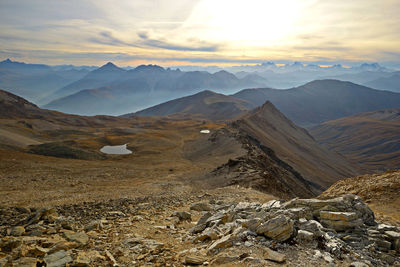 Scenic view of mountains against sky during sunset