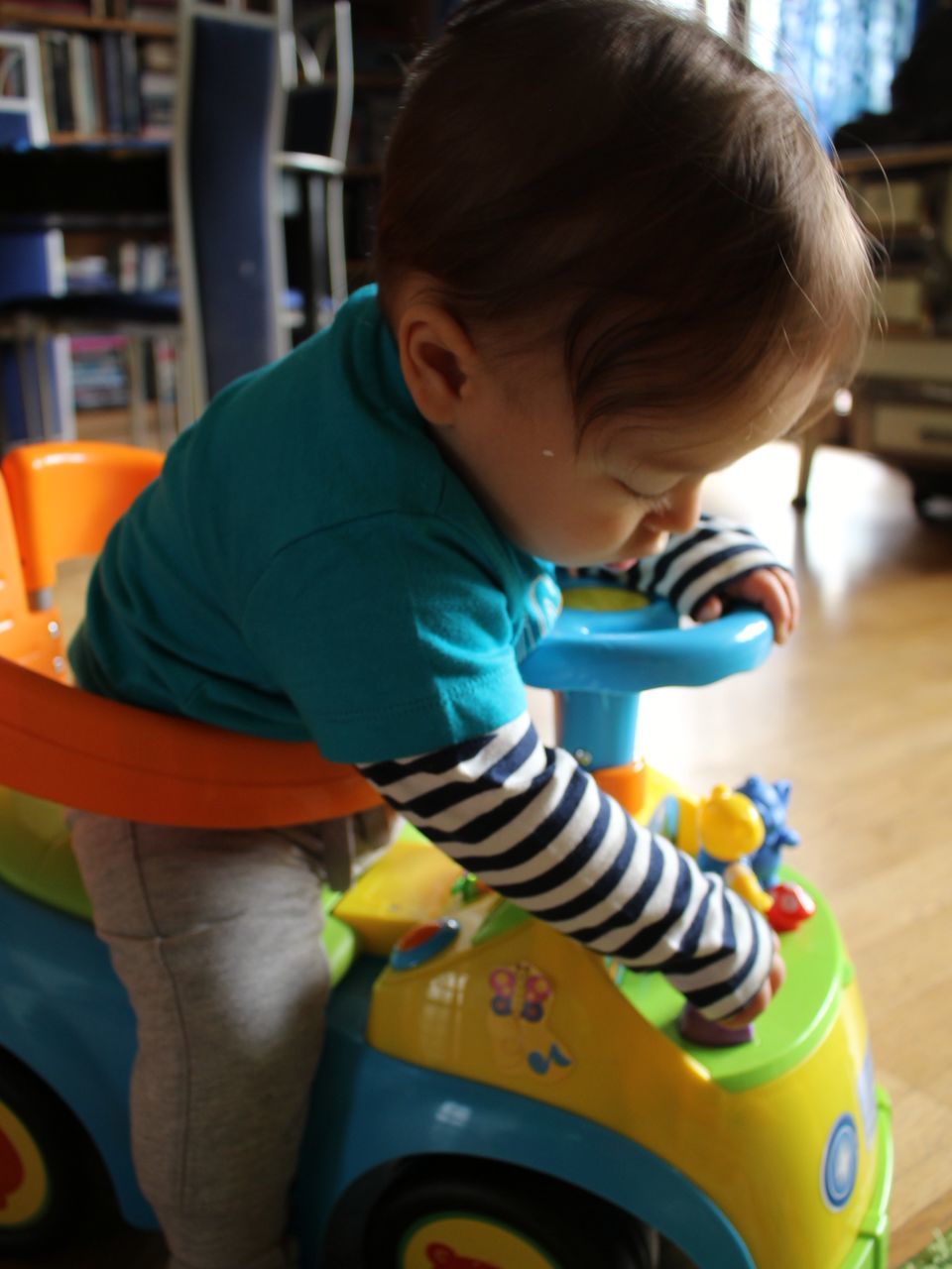 childhood, elementary age, boys, innocence, cute, lifestyles, person, casual clothing, leisure activity, girls, focus on foreground, sitting, playing, indoors, preschool age, holding, blond hair, three quarter length