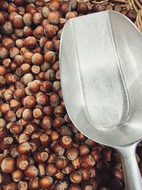 High angle view of chestnuts with serving scoop