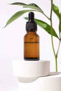 Close-up of bottle against white background