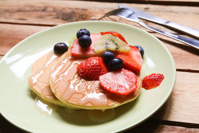 Close-up of breakfast served in plate