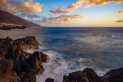 Scenic view of sea against sky during sunset