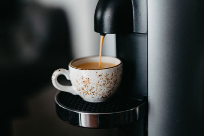 Close-up of coffee on table