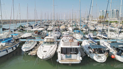 Boats moored at harbor