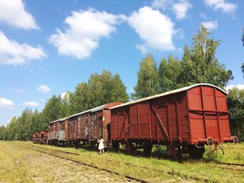 Train on railroad track against sky