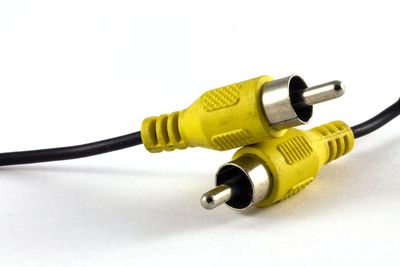 Close-up of coin-operated binoculars against white background