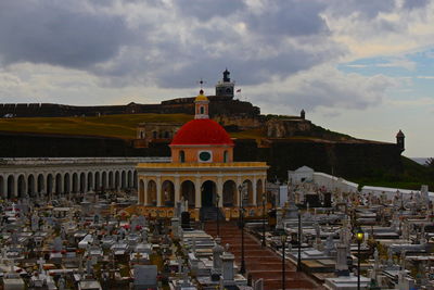 El morro castle and san juan cemetery against cloudy sky