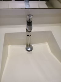 High angle view of faucet in bathroom