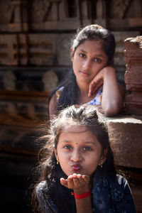 Lovely moments of two young girls pose