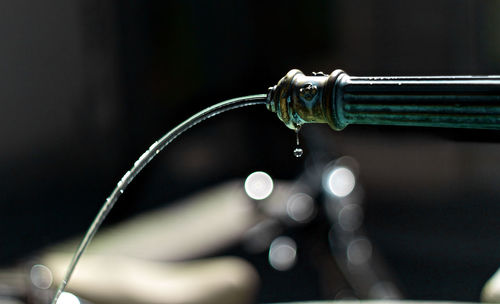 Cropped image of water falling from fountain