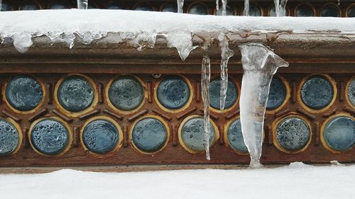 Close-up of snow on brick wall
