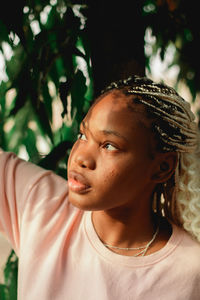 Portrait of young man looking away