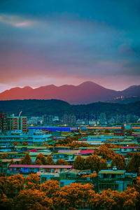 High angle view of townscape against sky during sunset