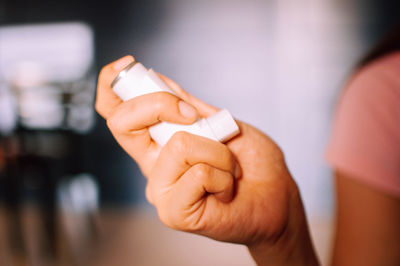 Close-up of man holding ice cream