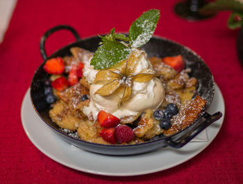 Close-up of dessert in container on table