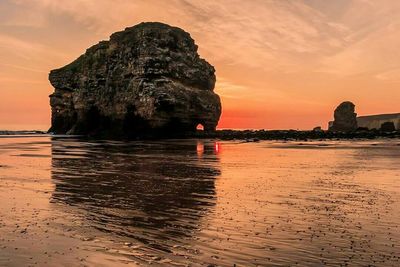 Scenic view of sea at sunset