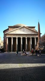 Group of people in front of building