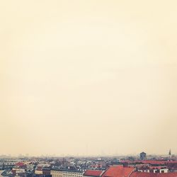 View of cityscape against clear sky