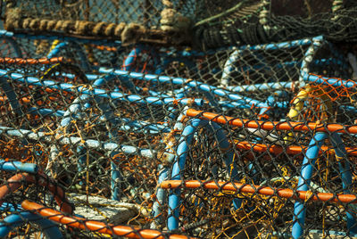 Close-up of fishing net at harbor