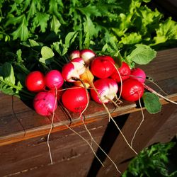 High angle view of red berries on table