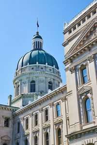 Low angle view of cathedral against clear blue sky