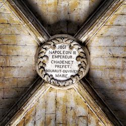 Low angle view of text on wall