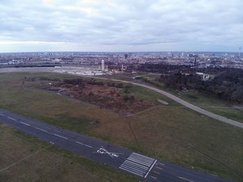 High angle view of airport runway against sky