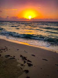 Scenic view of sea against sky during sunset