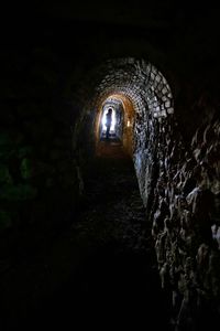 Illuminated tunnel in old building