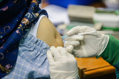 Midsection of man working