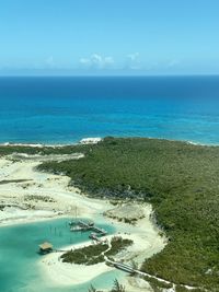 High angle view of swimming pool by sea against sky