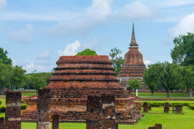 Panoramic view of old temple building against cloudy sky