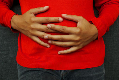 Close-up of couple holding hands