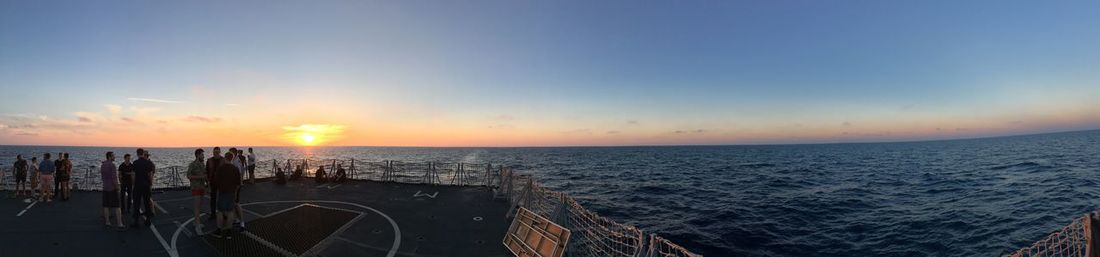 Panoramic view of sea against sky during sunset