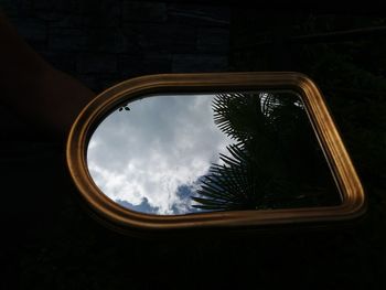 Low angle view of sky seen through window