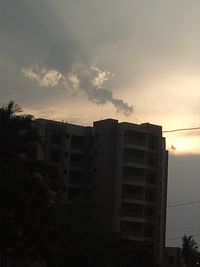 Exterior of building against sky at sunset