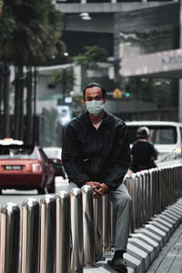 Man standing in car