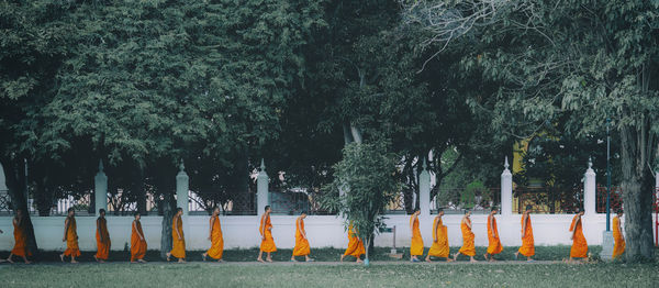 Phra nakhon si ayutthaya, thailand neophytes as children monk like alms round in temple 