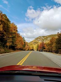 Road seen through car windshield