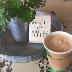 Close-up of coffee cup on table