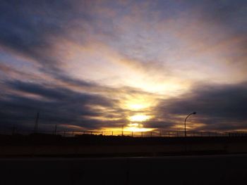 Scenic view of silhouette landscape against sky during sunset