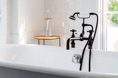 Close-up of sink in bathroom